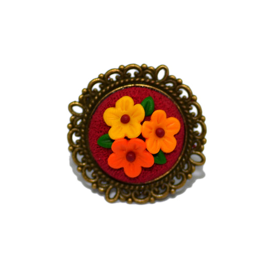 Στρογγυλό βίνταζ δαχτυλίδι με λουλουδάκια σε φθινοπωρινές αποχρώσεις από πολυμερικό πηλό
