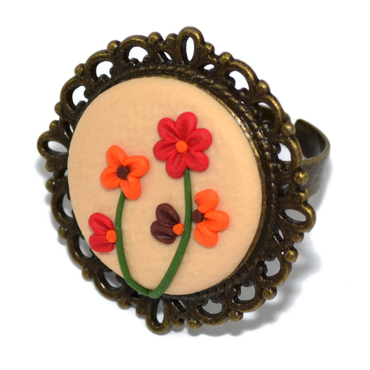 Στρογγυλό βίνταζ δαχτυλίδι με ανάγλυφα γλυπτά λουλουδάκια από πολυμερικό πηλό